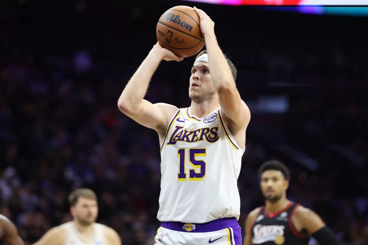 Los Angeles Lakers guard Austin Reaves (15) shoots a foul shot against the Philadelphia 76ers during the fourth quarter at Xfinity Mobile Arena.