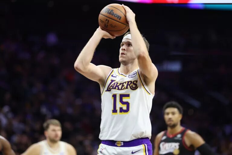 Los Angeles Lakers guard Austin Reaves (15) shoots a foul shot against the Philadelphia 76ers during the fourth quarter at Xfinity Mobile Arena.