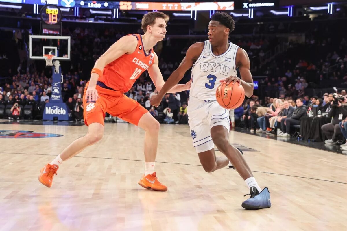BYU Cougars forward AJ Dybantsa (3) looks to drive past Clemson Tigers forward Jake Wahlin (10) in the first half at Madison Square Garden.