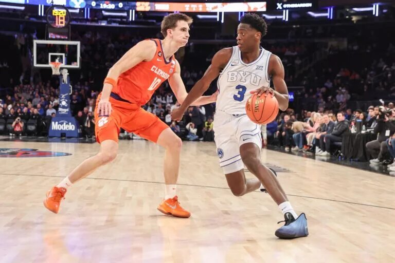 BYU Cougars forward AJ Dybantsa (3) looks to drive past Clemson Tigers forward Jake Wahlin (10) in the first half at Madison Square Garden.