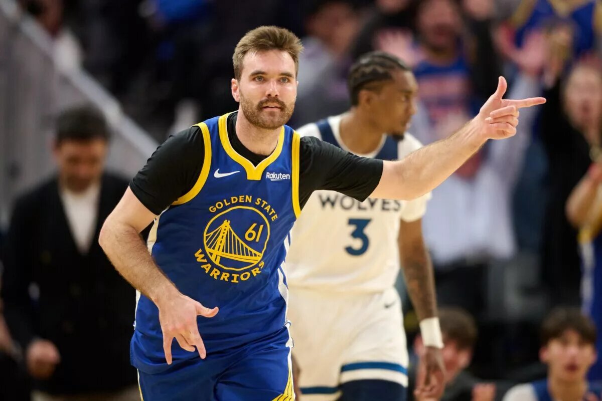 Dec 12, 2025; San Francisco, California, USA; Golden State Warriors guard Pat Spencer (61) acknowledges the Warriors bench after making a three-point shot against the Minnesota Timberwolves during the third quarter at Chase Center. Mandatory Credit: Robert Edwards-Imagn Images
