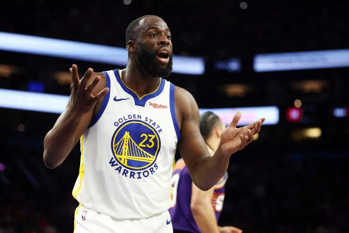 Dec 18, 2025; Phoenix, Arizona, USA; Golden State Warriors forward Draymond Green (23) reacts against the Phoenix Suns at Mortgage Matchup Center. Mandatory Credit: Mark J. Rebilas-Imagn Images