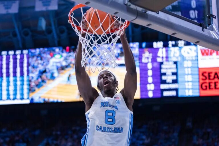 North Carolina Tar Heels forward Caleb Wilson (8) dunks during the second half against the East Carolina Pirates at Dean E. Smith Center.