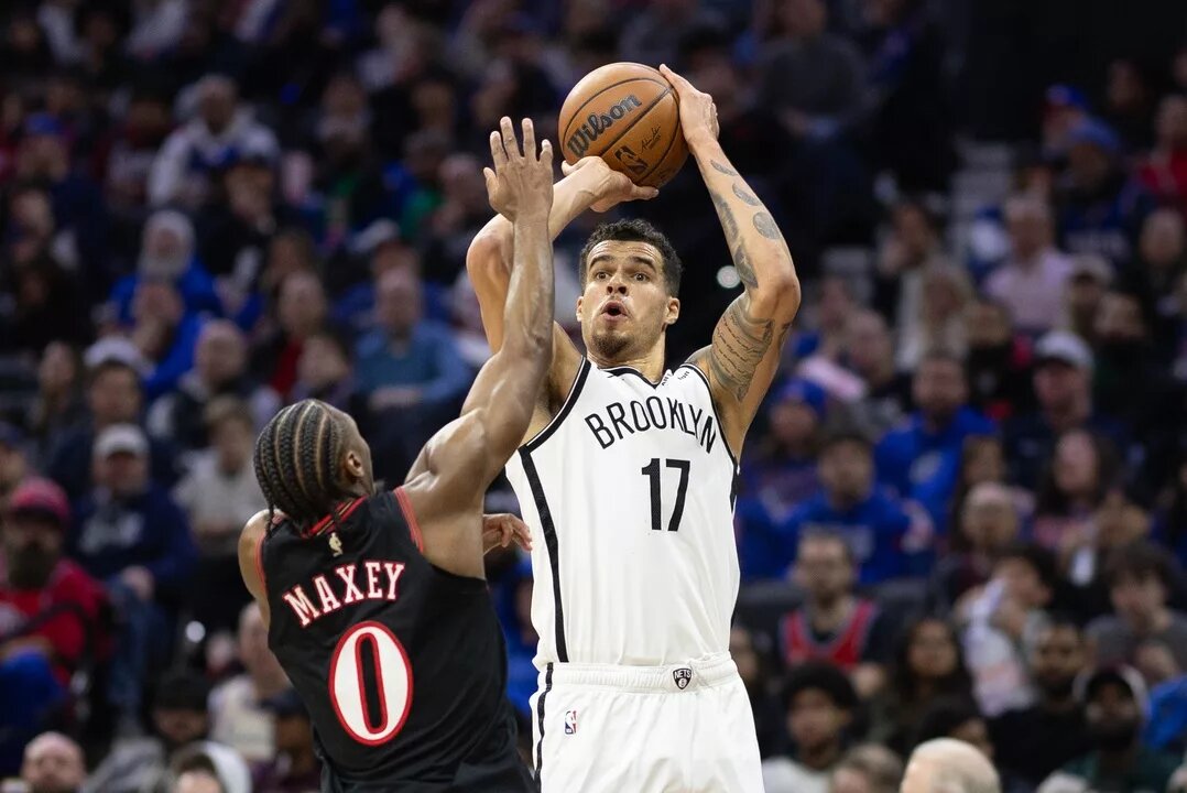 Brooklyn Nets forward Michael Porter Jr. (17) shoots in front of Philadelphia 76ers guard Tyrese Maxey (0) during the second quarter at Xfinity Mobile Arena.
