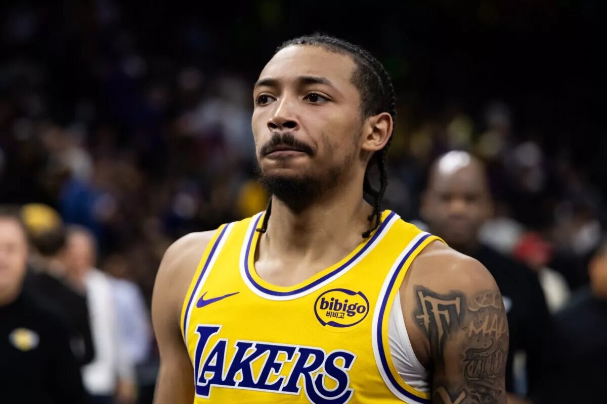 Dec 23, 2025; Phoenix, Arizona, USA; Los Angeles Lakers guard Nick Smith Jr. (20) against the Phoenix Suns at Mortgage Matchup Center. Mandatory Credit: Mark J. Rebilas-Imagn Images