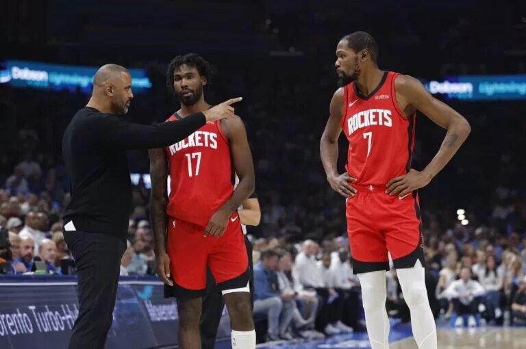 Rockets coach Ime Udoka points at Kevin Durant.