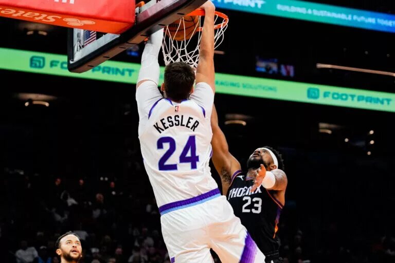 Utah Jazz center Walker Kessler (24) dunks in the first half between the Phoenix Suns and the Utah Jazz at Mortgage Matchup Center.