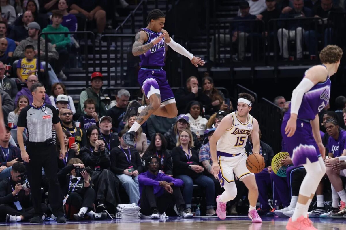 Los Angeles Lakers guard Austin Reaves fakes out Utah Jazz defense