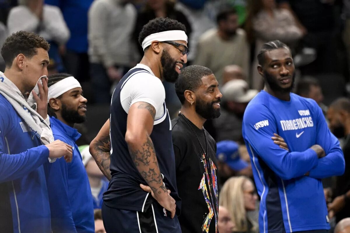 Dallas Mavericks stars Anthony Davis and Kyrie Irving alongside their teammates