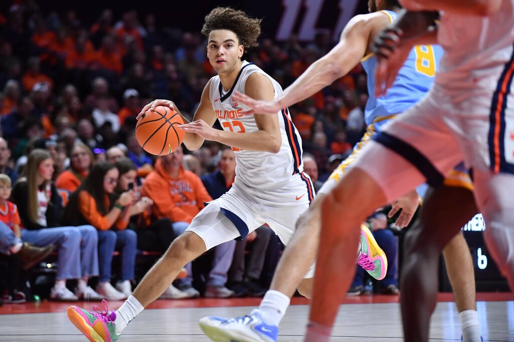 Illinois Fighting Illini guard Keaton Wagler (23) drives to the basket during the first hafl against the Southern University Jaguars f at State Farm Center.