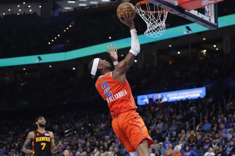 Oklahoma City Thunder guard Shai Gilgeous-Alexander (2) goes up for a basket against the Atlanta Hawks during the second half at Paycom Center.