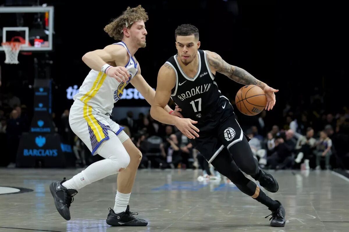 Brooklyn Nets forward Michael Porter Jr. drives against Golden State Warriors guard Brandin Podziemski
