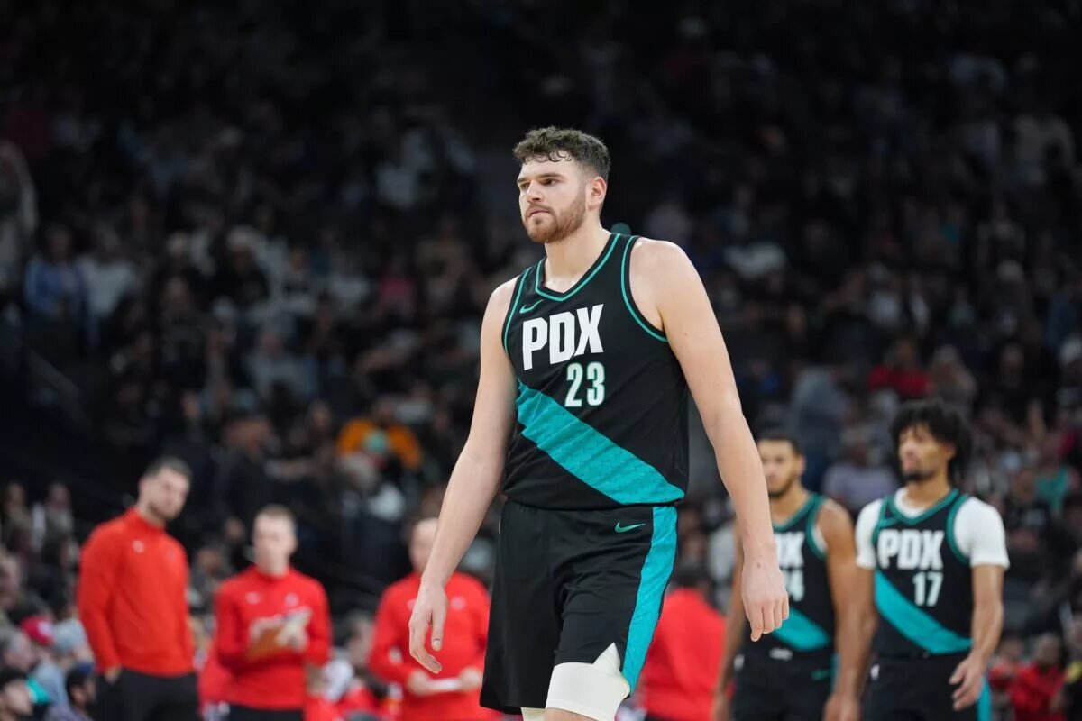 ; Portland Trail Blazers center Donovan Clingan (23) walks up the court in the first half against the San Antonio Spurs at Frost Bank Center.