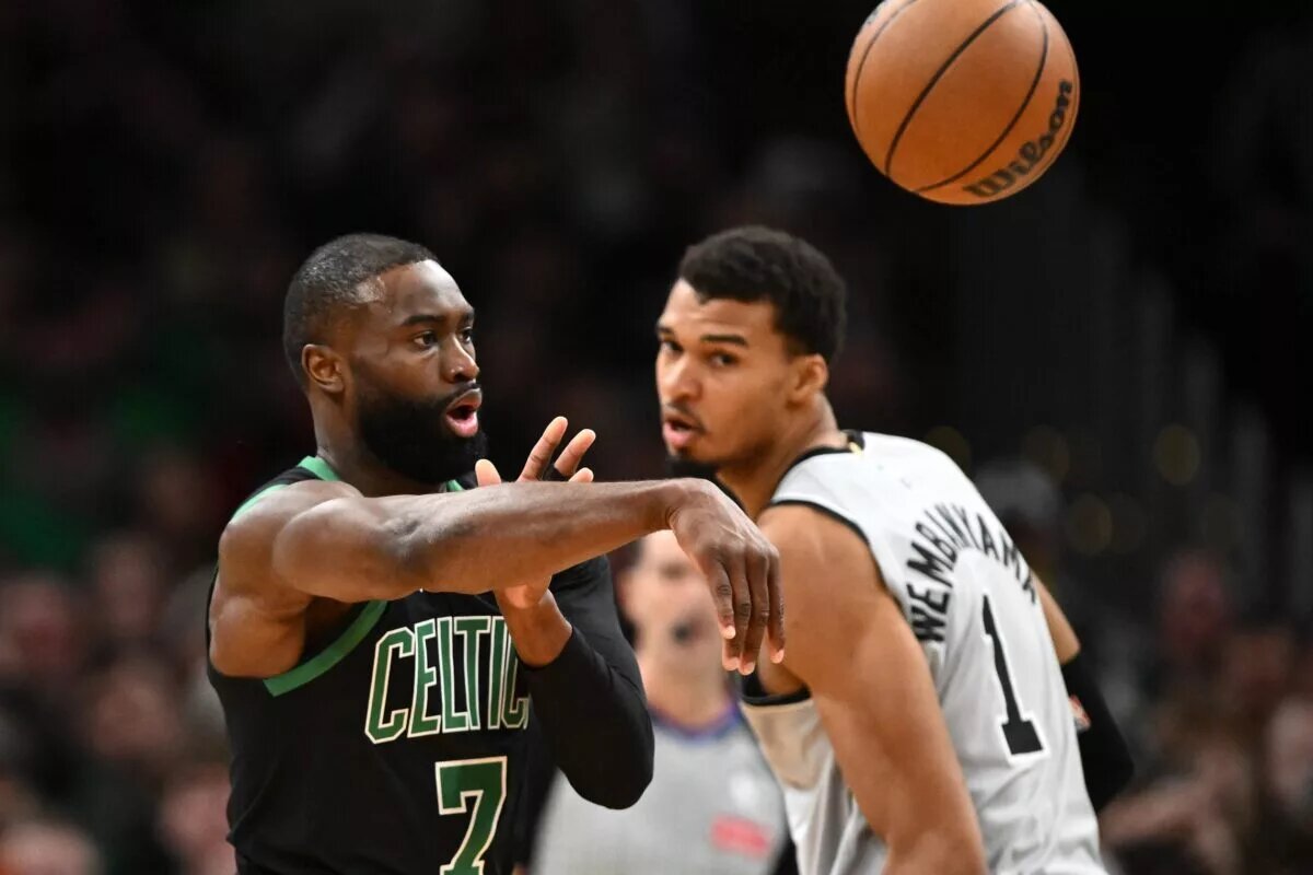 Jan 10, 2026; Boston, Massachusetts, USA; Boston Celtics guard Jaylen Brown (7) passes the ball against the San Antonio Spurs during the first half at the TD Garden. Mandatory Credit: Brian Fluharty-Imagn Images