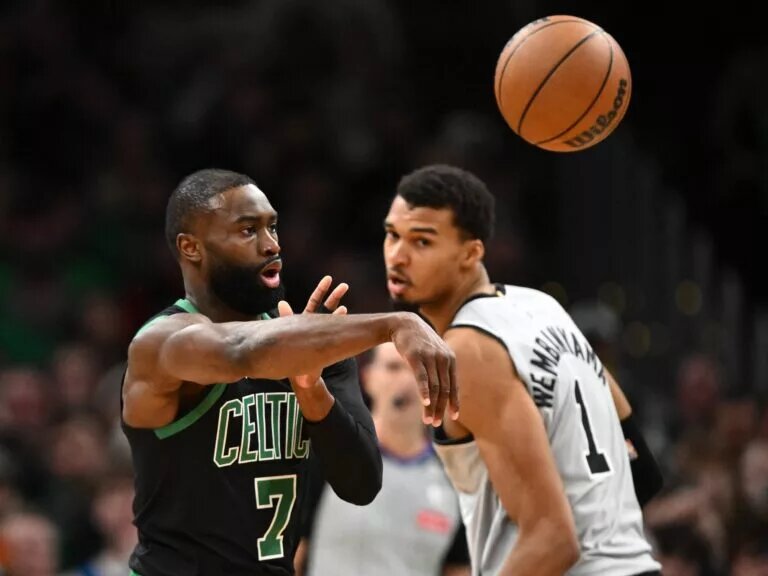 Jan 10, 2026; Boston, Massachusetts, USA; Boston Celtics guard Jaylen Brown (7) passes the ball against the San Antonio Spurs during the first half at the TD Garden. Mandatory Credit: Brian Fluharty-Imagn Images