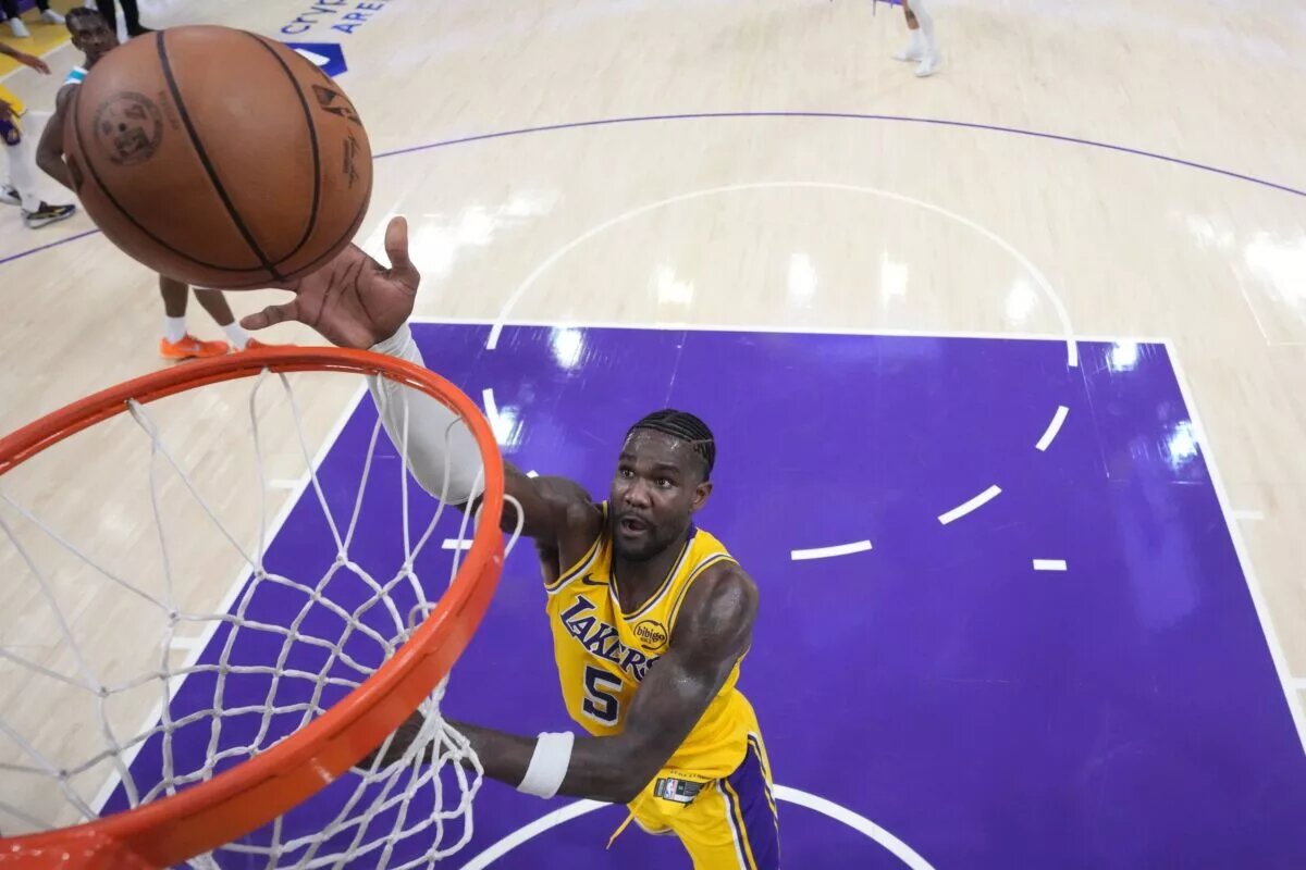 Jan 15, 2026; Los Angeles, California, USA; Los Angeles Lakers center Deandre Ayton (5) shoots the ball against the Charlotte Hornets in the second half at Crypto.com Arena. Mandatory Credit: Kirby Lee-Imagn Images