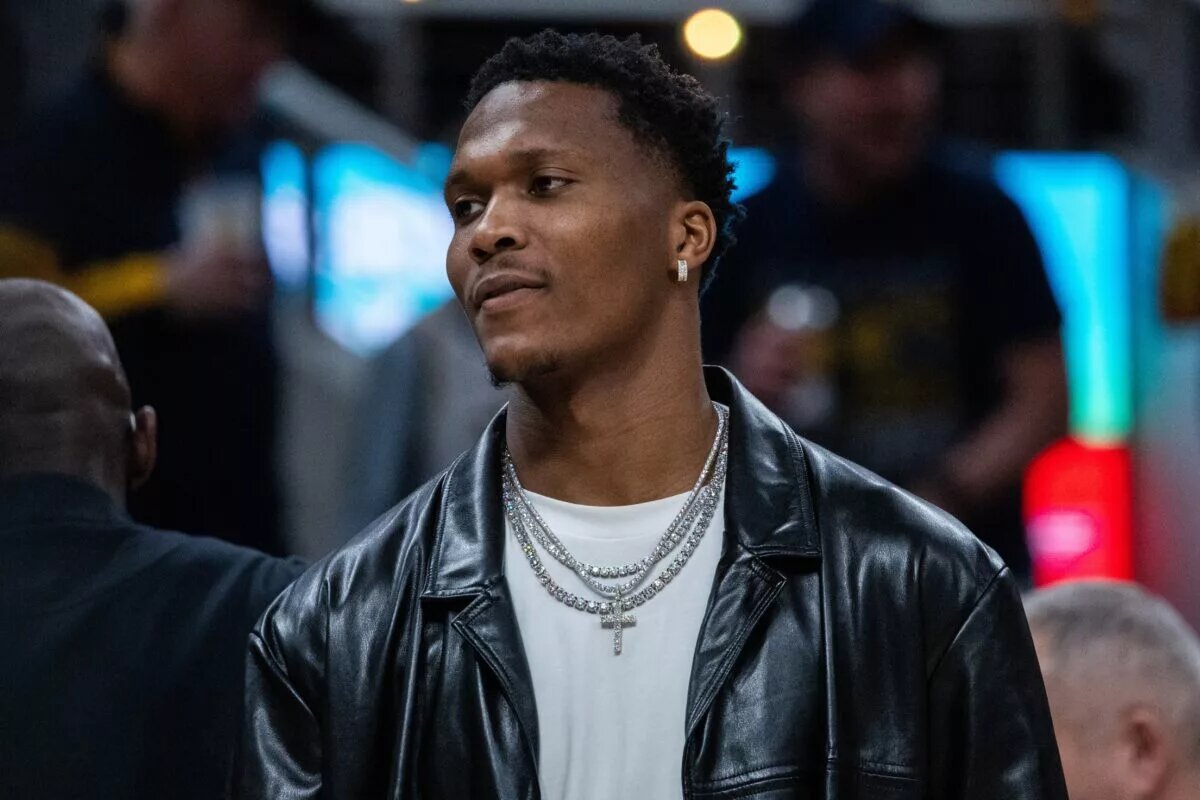 Indiana Pacers wing Bennedict Mathurin looks on from bench as his team faces the New Orleans Pelicans