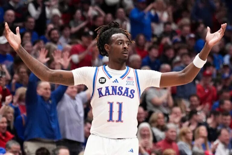 Jan 16, 2026; Lawrence, Kansas, USA; Kansas Jayhawks guard Jamari McDowell (11) celebrates after a score against the Baylor Bears during the second half of the game at Allen Fieldhouse. Mandatory Credit: Denny Medley-Imagn Images