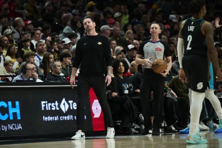 Jan 17, 2026; Portland, Oregon, USA; Los Angeles Lakers head coach JJ Redick reacts during the second half to an officials call against the Portland Trail Blazers at Moda Center. Mandatory Credit: Troy Wayrynen-Imagn Images