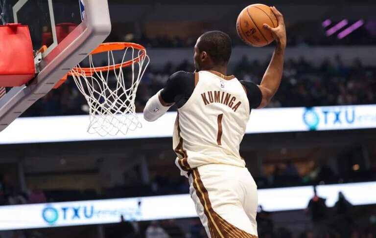 Golden State Warriors trade candidate Jonathan Kuminga goes up high for a dunk