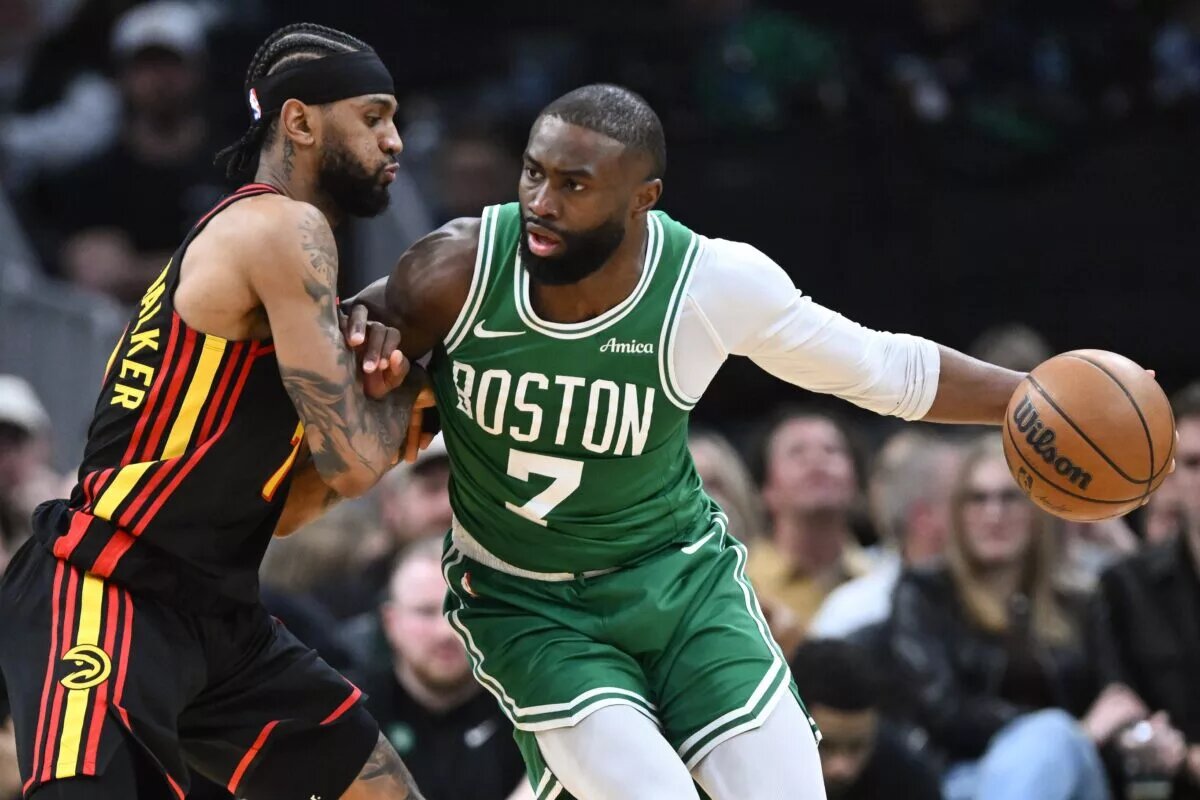 Boston Celtics guard Jaylen Brown (7) drives to the basket against Atlanta Hawks guard Nickeil Alexander-Walker (7) during the first half at the TD Garden.