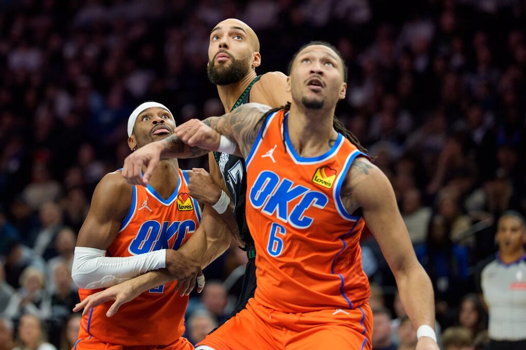 Jan 29, 2026; Minneapolis, Minnesota, USA; Oklahoma City Thunder forward Jaylin Williams (6) boxes out Minnesota Timberwolves center Rudy Gobert (27) in the second quarter at Target Center. Mandatory Credit: Matt Blewett-Imagn Images