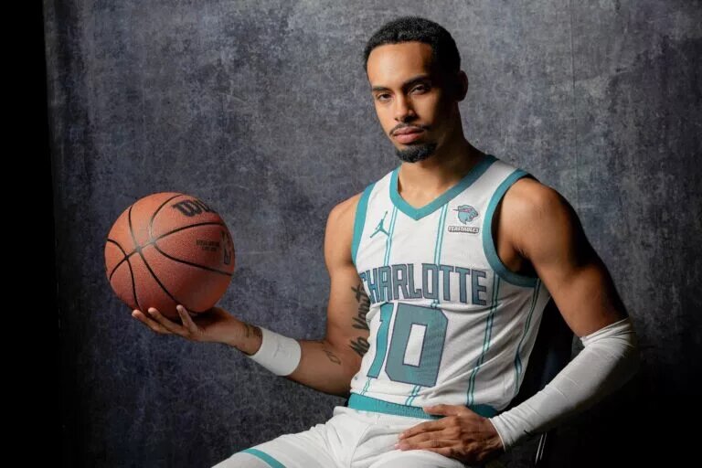 Charlotte Hornets Amari Bailey (10) poses for a photo during Charlotte Hornets Media Day at the Spectrum Center.