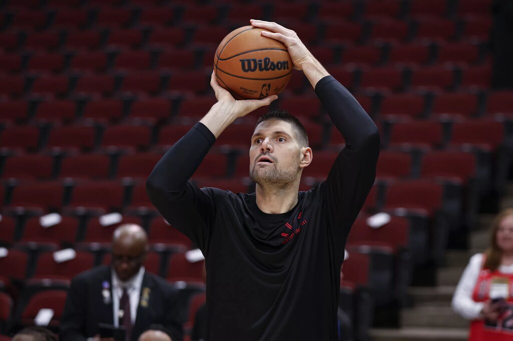 Dec 21, 2024; Chicago, Illinois, USA; Chicago Bulls center Nikola Vucevic (9) warms up before a basketball game against the Boston Celtics at United Center. Mandatory Credit: Kamil Krzaczynski-Imagn Images