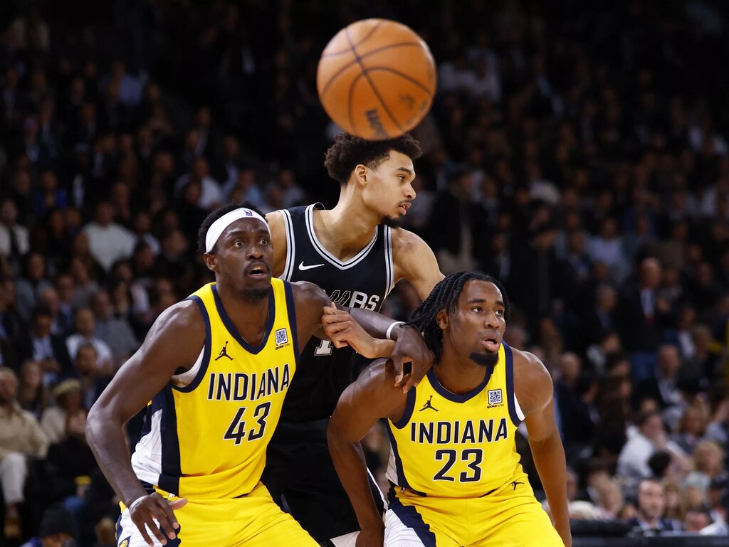 [US, Mexico, & Canada customers only] Jan 23, 2025; Paris, FRANCE; San Antonio Spurs player Victor Wembanyama battles for position with Indiana Pacers players Pascal Siakam and Aaron Nesmith in the Paris Games 2025 NBA basketball game at Accor Arena. Mandatory Credit: Stephanie Lecocq/Reuters via Imagn Images