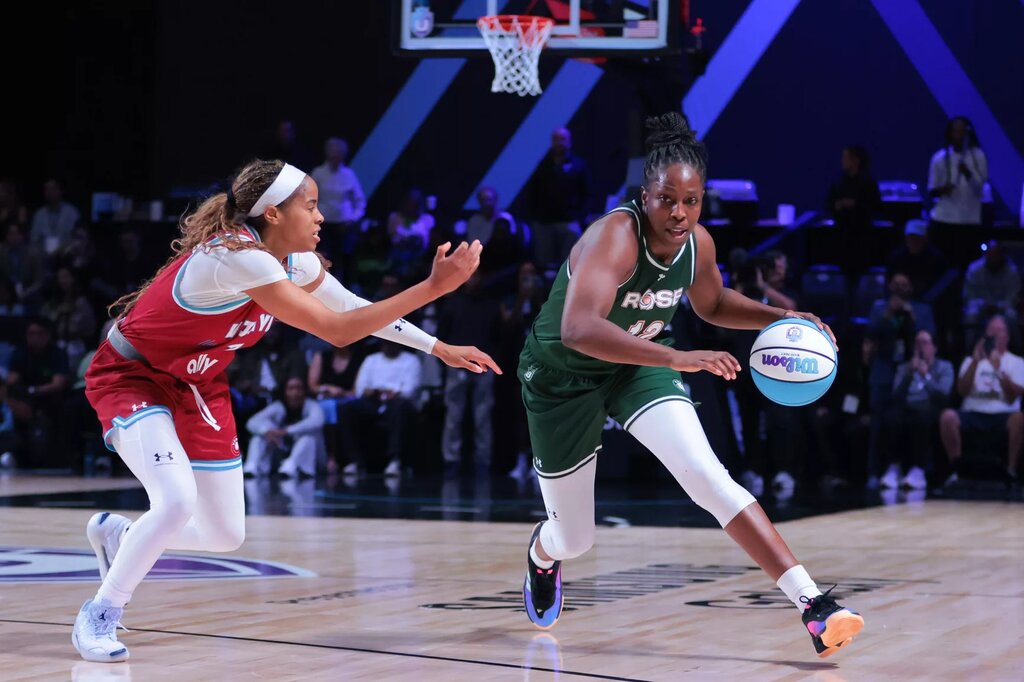  Rose BC guard Chelsea Gray (12) dribbles the basketball past Vinyl BC guard Jordin Canada (3) during the fourth quarter of the Unrivaled Championship game at Wayfair Arena.