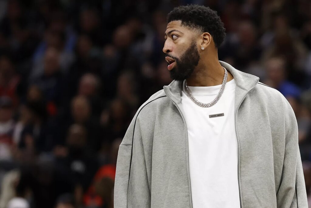 Nov 8, 2025; Washington, District of Columbia, USA; Injured Dallas Mavericks forward Anthony Davis looks on from the bench during a timeout against the Washington Wizards in the second half at Capital One Arena. Mandatory Credit: Geoff Burke-Imagn Images