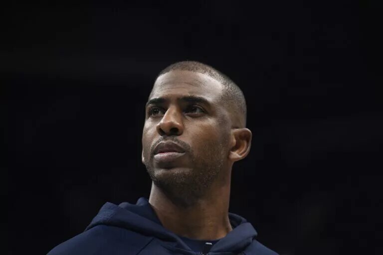 Nov 22, 2025; Charlotte, North Carolina, USA; Los Angeles Clippers guard Chris Paul (3) in a time out during the first half against the Charlotte Hornets at the Spectrum Center. Mandatory Credit: Sam Sharpe-Imagn Images