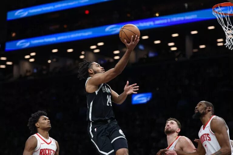 Brooklyn Nets guard Cam Thomas scores against Houston Rockets