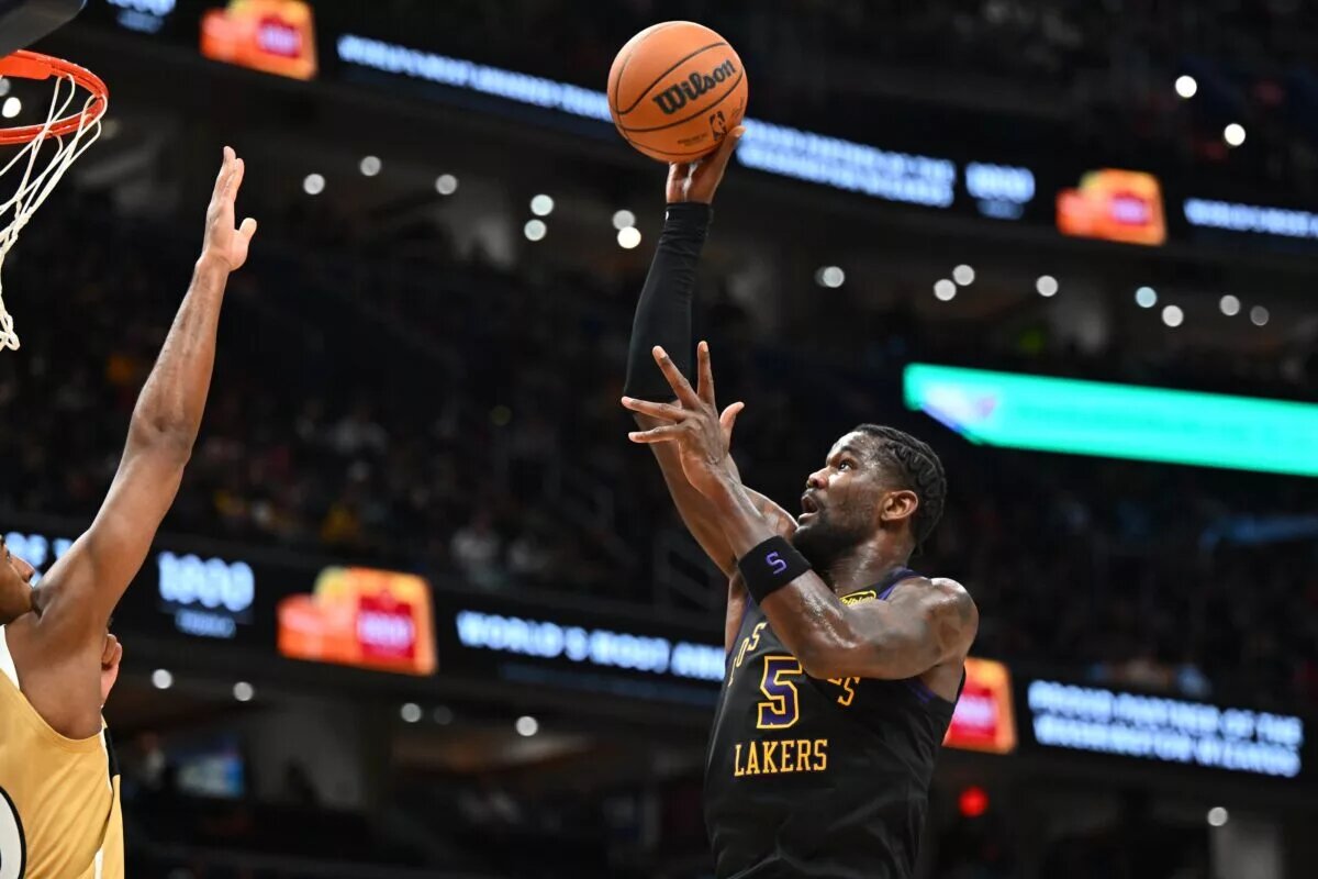 Jan 30, 2026; Washington, District of Columbia, USA; Los Angeles Lakers center Deandre Ayton (5) attempts a shot against the Washington Wizards during the second half at Capital One Arena. Mandatory Credit: Brad Mills-Imagn Images