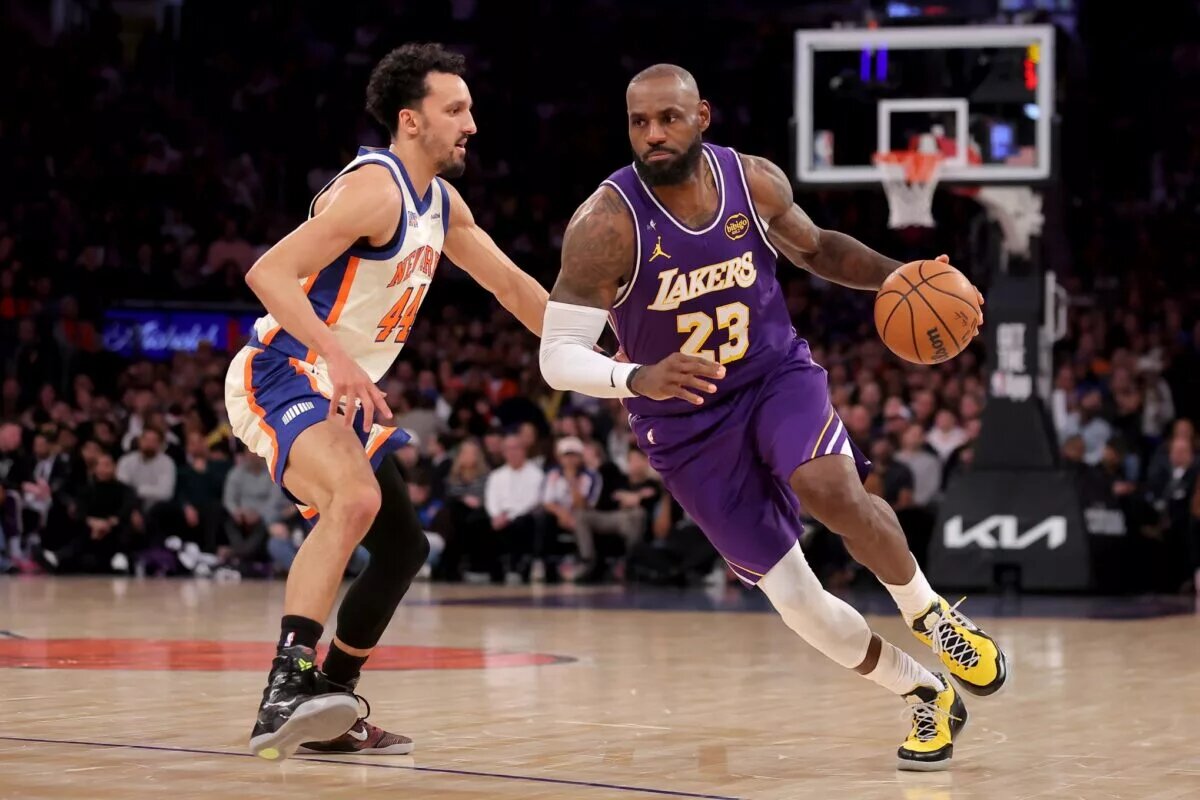 Feb 1, 2026; New York, New York, USA; Los Angeles Lakers forward LeBron James (23) controls the ball against New York Knicks guard Landry Shamet (44) during the third quarter at Madison Square Garden. Mandatory Credit: Brad Penner-Imagn Images