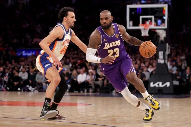 Feb 1, 2026; New York, New York, USA; Los Angeles Lakers forward LeBron James (23) controls the ball against New York Knicks guard Landry Shamet (44) during the third quarter at Madison Square Garden. Mandatory Credit: Brad Penner-Imagn Images