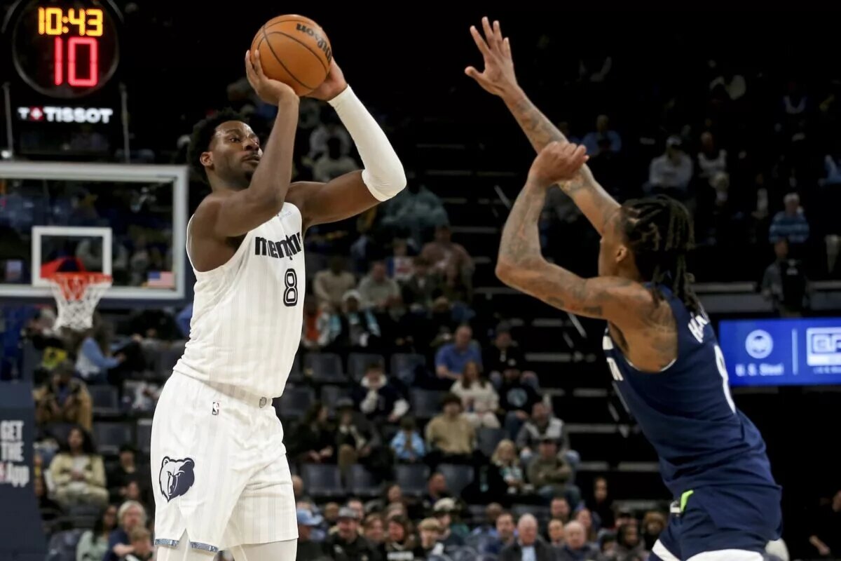 Feb 2, 2026; Memphis, Tennessee, USA; Memphis Grizzlies forward/center Jaren Jackson Jr. (8) shoots during the second quarter against the Minnesota Timberwolves at FedExForum. Mandatory Credit: Petre Thomas-Imagn Images