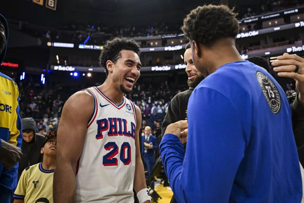 Philadelphia 76ers guard Jared McCain (20) smiles post game after defeating the Golden State Warriors at Chase Center.