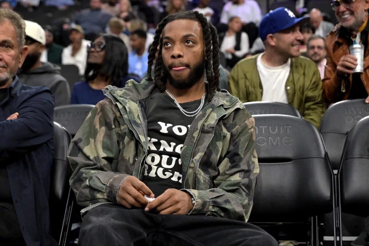 Feb 4, 2026; Inglewood, California, USA; Los Angeles Clippers Darius Garland watches the game against the Cleveland Cavaliers in the second half at Intuit Dome. Mandatory Credit: Jayne Kamin-Oncea-Imagn Images