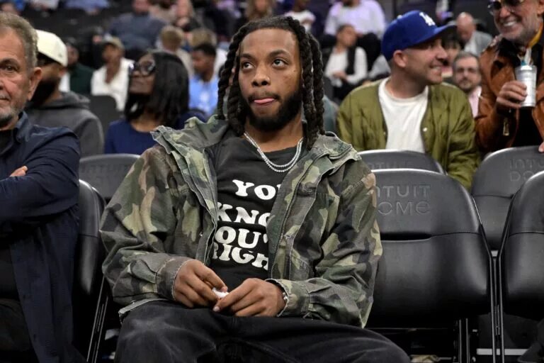 Feb 4, 2026; Inglewood, California, USA; Los Angeles Clippers Darius Garland watches the game against the Cleveland Cavaliers in the second half at Intuit Dome. Mandatory Credit: Jayne Kamin-Oncea-Imagn Images
