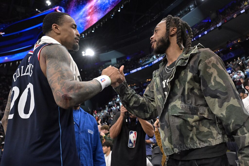 Feb 4, 2026; Inglewood, California, USA; Los Angeles Clippers Darius Garland is greeted by Los Angeles Clippers forward John Collins (20) during the game against the Cleveland Cavaliers at Intuit Dome. Mandatory Credit: Jayne Kamin-Oncea-Imagn Images