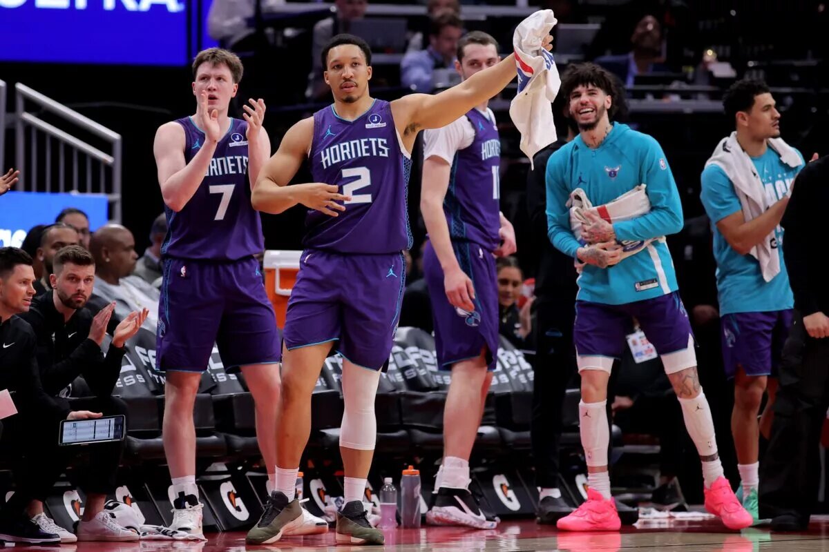 Feb 5, 2026; Houston, Texas, USA; Charlotte Hornets players react after a basket against the Houston Rockets during the fourth quarter at Toyota Center. Mandatory Credit: Erik Williams-Imagn Images