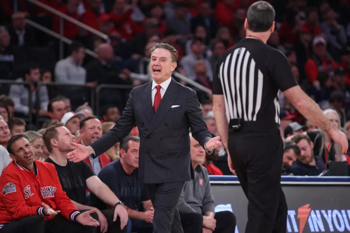 St. John's Red Storm head coach Rick Pitino argues with an official in the first half against the UConn Huskies at Madison Square Garden.