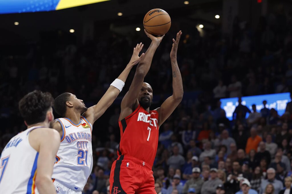 Houston Rockets forward Kevin Durant (7) shoots against the Oklahoma City Thunder during the second half at Paycom Center.
