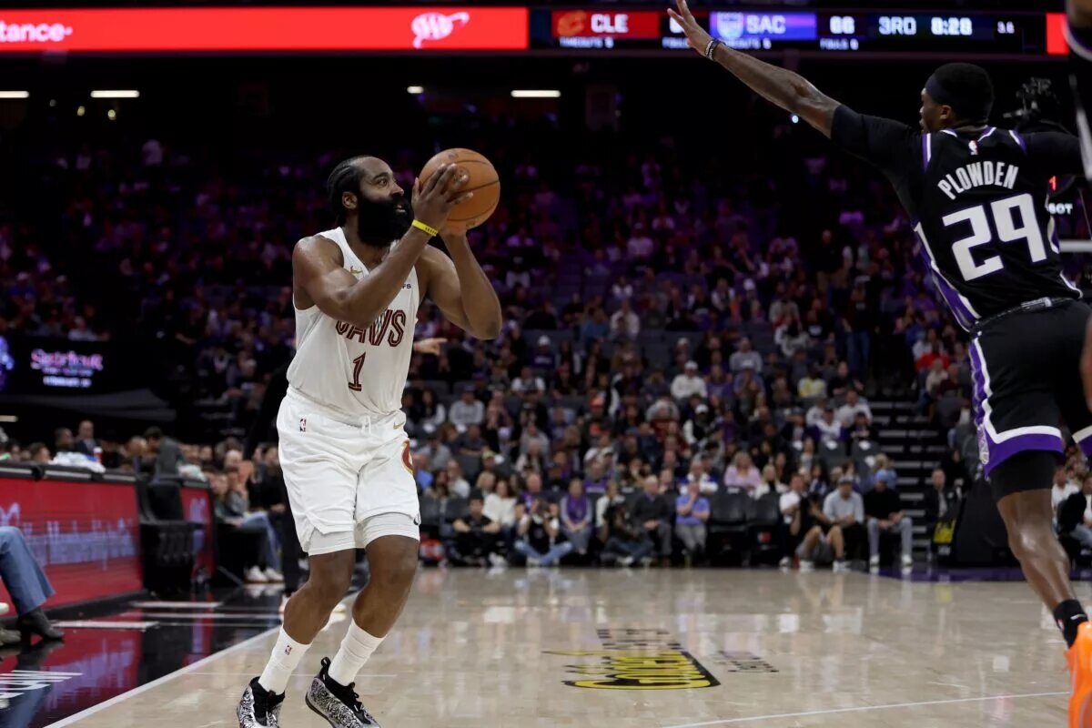 Feb 7, 2026; Sacramento, California, USA; Cleveland Cavaliers guard James Harden (1) shoots the ball over Sacramento Kings guard-forward Daeqwon Plowden (29) during the third quarter at Golden 1 Center. Mandatory Credit: Dennis Lee-Imagn Images