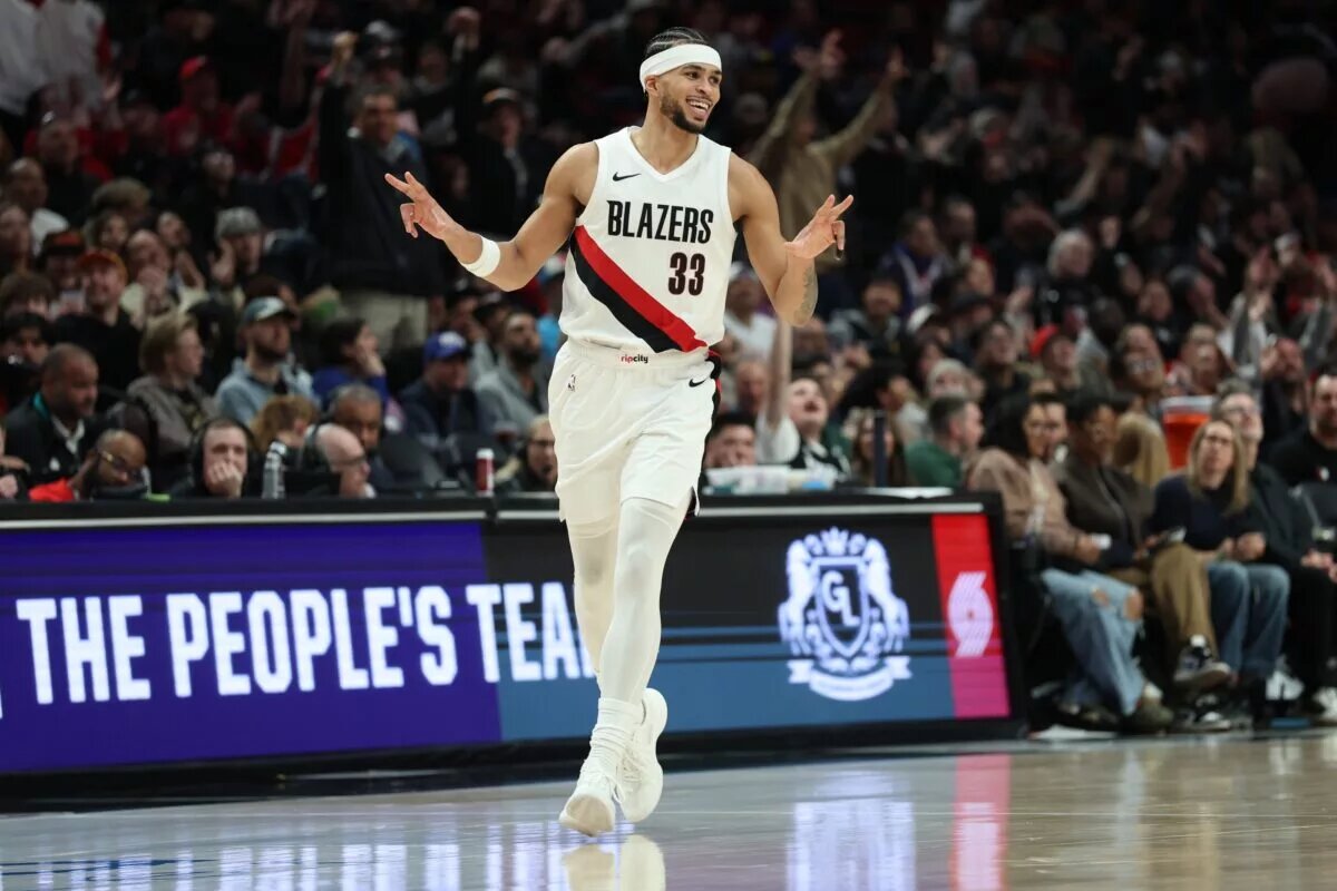 Portland Trail Blazers forward Toumani Camara (33) reacts after scoring against the Philadelphia 76ers during the second half at Moda Center.