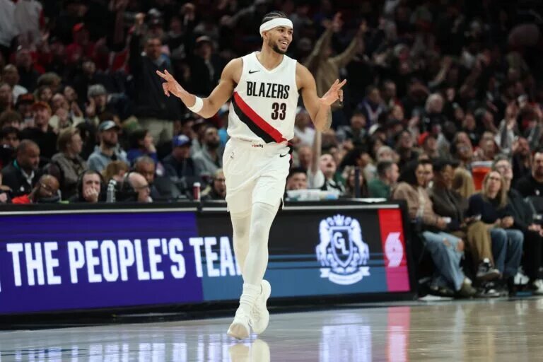 Portland Trail Blazers forward Toumani Camara (33) reacts after scoring against the Philadelphia 76ers during the second half at Moda Center.