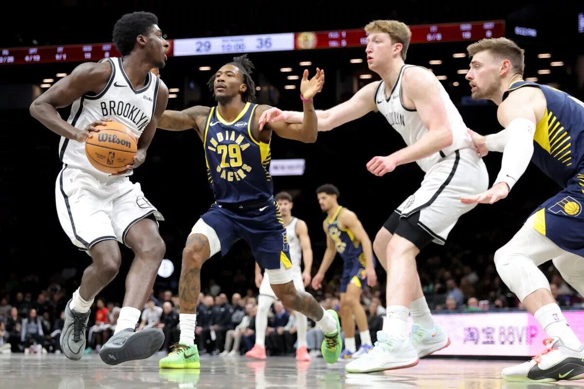 Indiana Pacers guard Quenton Jackson plays defense against Brooklyn Nets wing Drake Powell