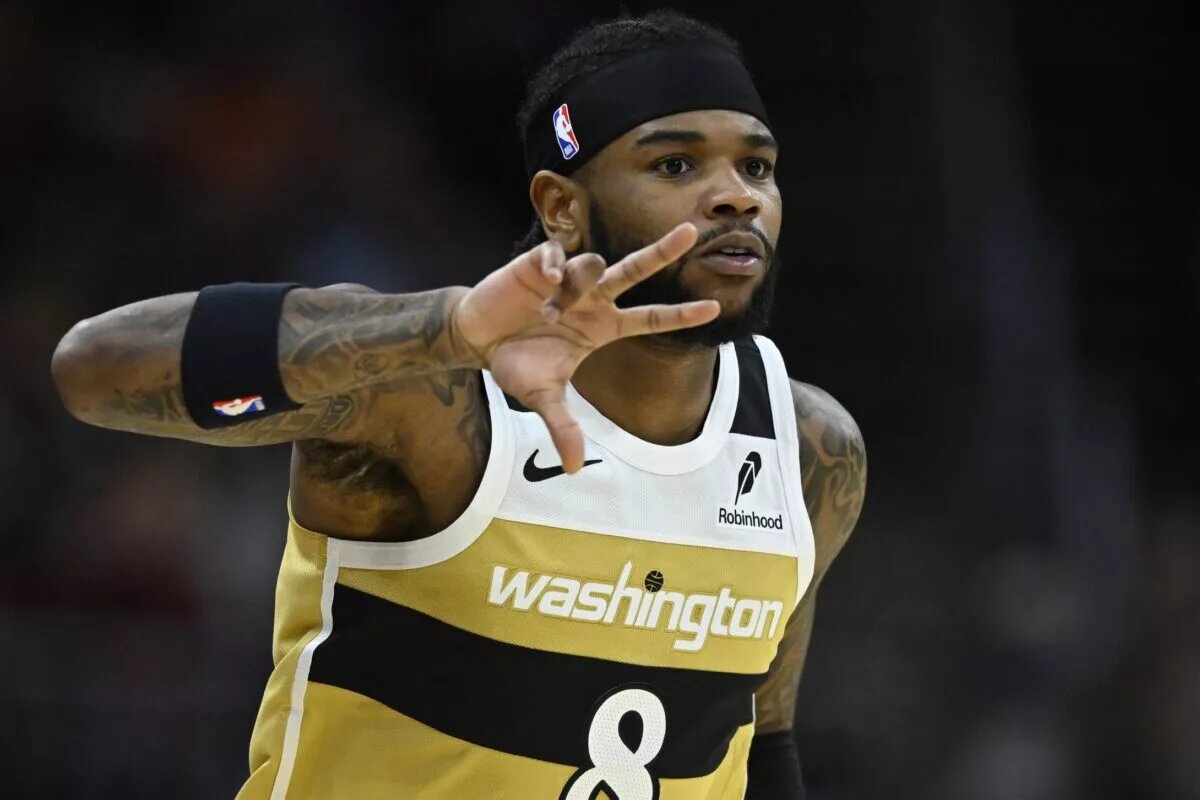 Feb 11, 2026; Cleveland, Ohio, USA; Washington Wizards guard Jaden Hardy (8) celebrates his three-point basket in the fourth quarter against the Cleveland Cavaliers at Rocket Arena. Mandatory Credit: David Richard-Imagn Images