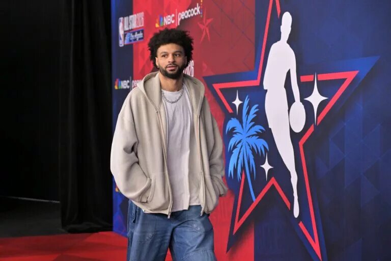 Feb 15, 2026; Los Angeles, CA, USA; Team World guard Jamal Murray (27) of the Denver Nuggets on the red carpet before the 75th NBA All Star Game at Intuit Dome. Mandatory Credit: Jayne Kamin-Oncea-Imagn Images